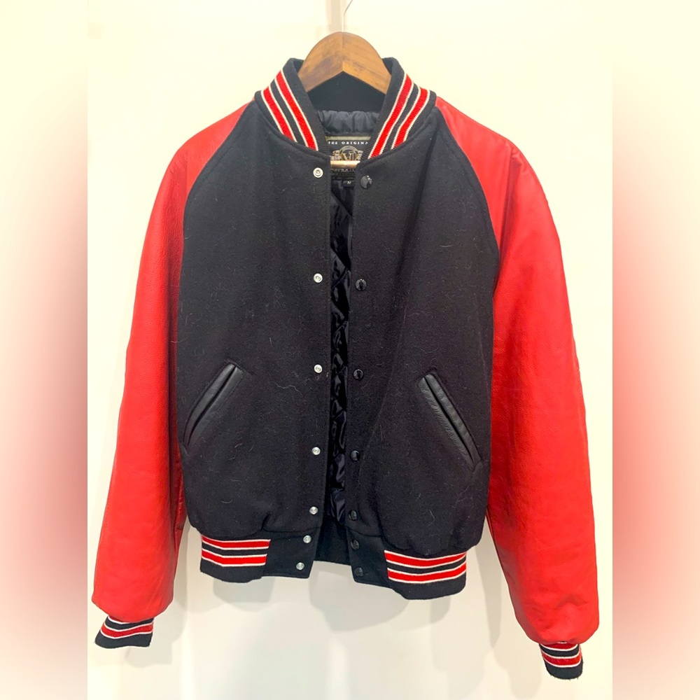 Genuine Holloway 100% real leather varsity jacket.